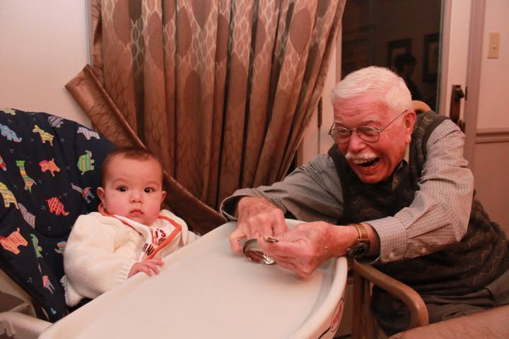 Jack Weaver performing the infamous spoon trick for a baby